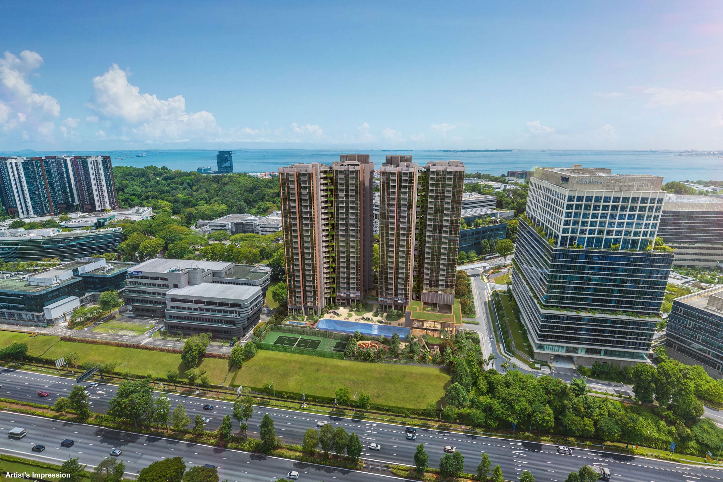Aerial view of a modern residential complex with tall towers, a rooftop pool, tennis courts, and landscaped gardens, surrounded by greenery and urban buildings. The ocean is visible in the distance under a partly cloudy sky.